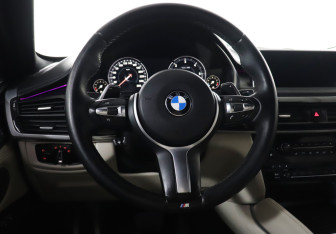 Подержанный автомобиль BMW X6 2015 года (18 фото)
