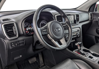 Подержанный автомобиль Kia Sportage 2018 года (15 фото)