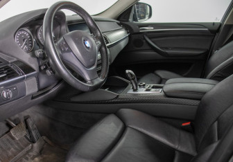 Подержанный автомобиль BMW X6 2013 года (11 фото)