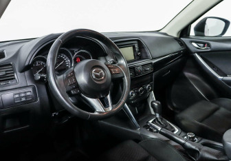 Подержанный автомобиль Mazda CX-5 2014 года (8 фото)