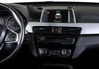 Подержанный автомобиль BMW X1 2016 года (14 фото)