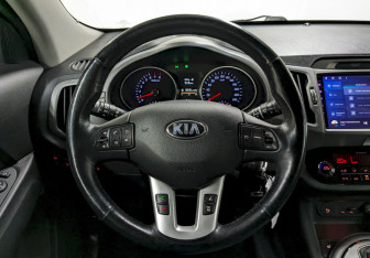 Подержанный автомобиль Kia Sportage 2014 года (25 фото)