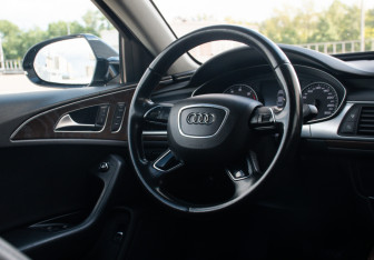 Подержанный автомобиль Audi A6 Sedan 2015 года (15 фото)