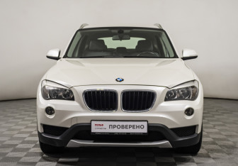Подержанный автомобиль BMW X1 2014 года (2 фото)