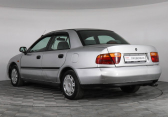 Подержанный автомобиль Mitsubishi Carisma Sedan 1998 года (4 фото)