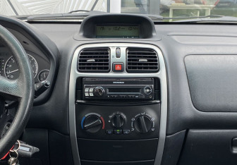 Подержанный автомобиль Mitsubishi Space Star Compactvan 2004 года (12 фото)