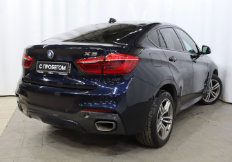 Подержанный автомобиль BMW X6 2019 года (4 фото)