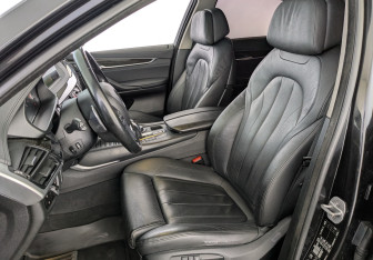 Подержанный автомобиль BMW X6 2016 года (21 фото)