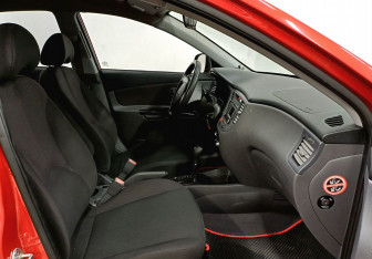 Подержанный автомобиль Kia Rio Sedan 2010 года (18 фото)