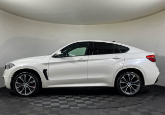 Подержанный автомобиль BMW X6 2016 года (5 фото)
