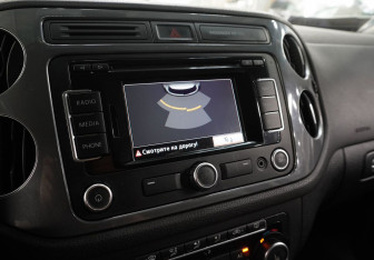Подержанный автомобиль Volkswagen Tiguan 2012 года (14 фото)