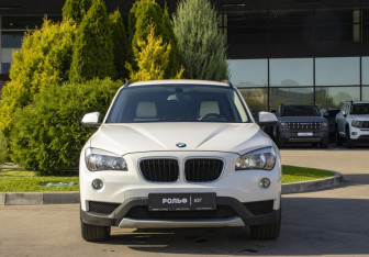 Подержанный автомобиль BMW X1 2014 года (2 фото)