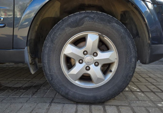 Подержанный автомобиль SsangYong Kyron 2014 года (13 фото)