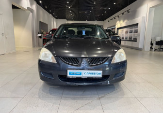 Подержанный автомобиль Mitsubishi Lancer Sedan 2004 года (2 фото)