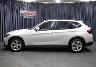 Подержанный автомобиль BMW X1 2013 года (8 фото)