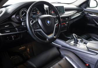 Подержанный автомобиль BMW X6 2016 года (14 фото)