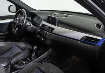 Подержанный автомобиль BMW X1 2018 года (9 фото)