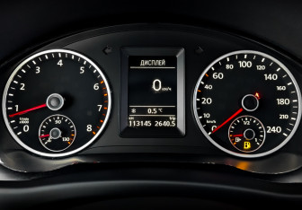 Подержанный автомобиль Volkswagen Tiguan 2013 года (13 фото)