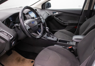 Подержанный автомобиль Ford Focus Sedan 2015 года (10 фото)