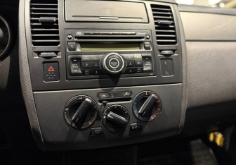 Подержанный автомобиль Nissan Tiida Sedan 2008 года (7 фото)