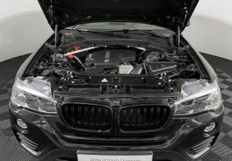 Подержанный автомобиль BMW X4 2016 года (10 фото)