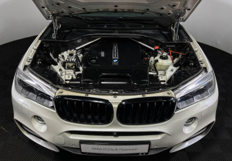 Подержанный автомобиль BMW X6 2016 года (10 фото)