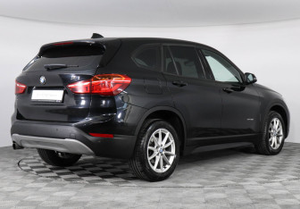 Подержанный автомобиль BMW X1 2017 года (2 фото)