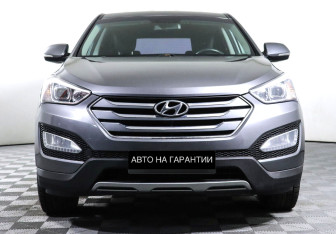 Подержанный автомобиль Hyundai Santa Fe 2014 года (2 фото)
