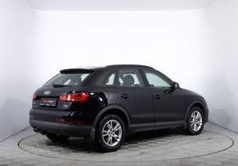 Подержанный автомобиль Audi Q3 2015 года (5 фото)