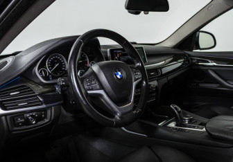 Подержанный автомобиль BMW X6 2016 года (11 фото)