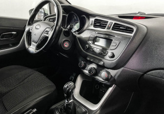 Подержанный автомобиль Kia Ceed Hatchback 2014 года (9 фото)