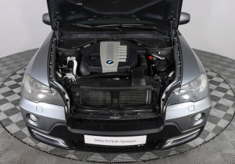 Подержанный автомобиль BMW X5 2009 года (10 фото)