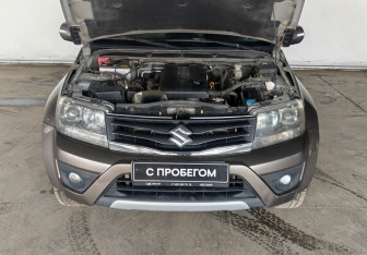 Подержанный автомобиль Suzuki Grand Vitara 2013 года (17 фото)