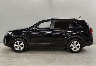 Подержанный автомобиль Kia Sorento 2014 года (8 фото)