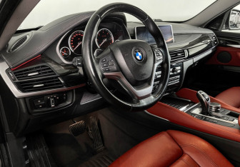 Подержанный автомобиль BMW X6 2017 года (12 фото)