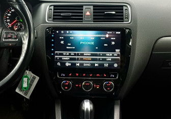 Подержанный автомобиль Volkswagen Jetta Sedan 2014 года (14 фото)