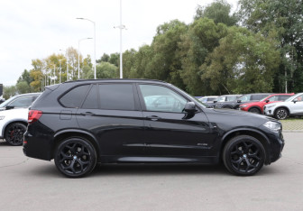 Подержанный автомобиль BMW X5 2014 года (4 фото)