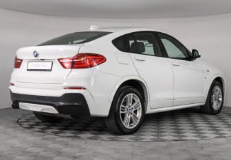 Подержанный автомобиль BMW X4 2016 года (2 фото)