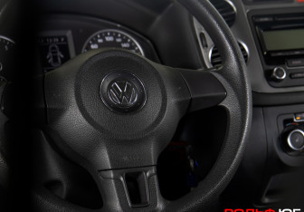 Подержанный автомобиль Volkswagen Tiguan 2011 года (13 фото)