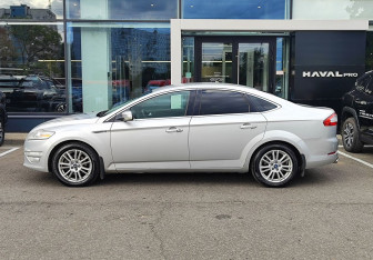 Подержанный автомобиль Ford Mondeo Liftback 2013 года (8 фото)