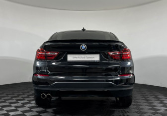Подержанный автомобиль BMW X4 2016 года (4 фото)