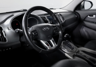 Подержанный автомобиль Kia Sportage 2015 года (14 фото)