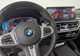Подержанный автомобиль BMW X4 2023 года (13 фото)