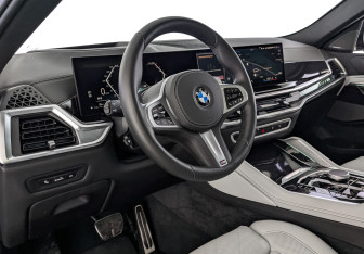 Подержанный автомобиль BMW X6 2025 года (15 фото)