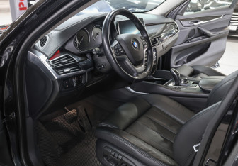 Подержанный автомобиль BMW X6 2015 года (16 фото)