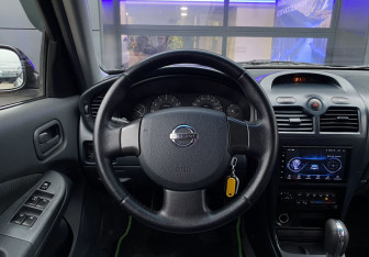 Подержанный автомобиль Nissan Almera Classic 2006 года (12 фото)