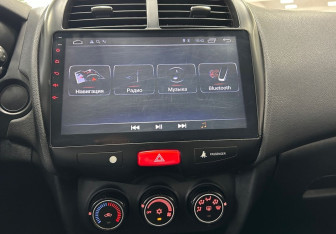 Подержанный автомобиль Mitsubishi ASX 2011 года (17 фото)