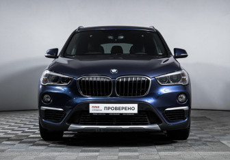 Подержанный автомобиль BMW X1 2015 года (2 фото)