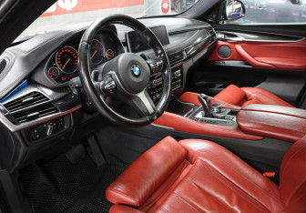 Подержанный автомобиль BMW X6 2017 года (17 фото)