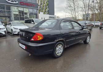 Подержанный автомобиль Kia Spectra Sedan 2006 года (5 фото)